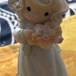 Precious Moments Figurine with Floral Bouquet in Cream and Pink
